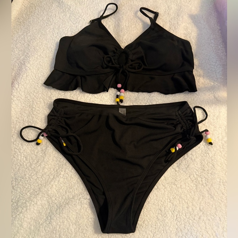 Very stylish black bikini bead tassels
